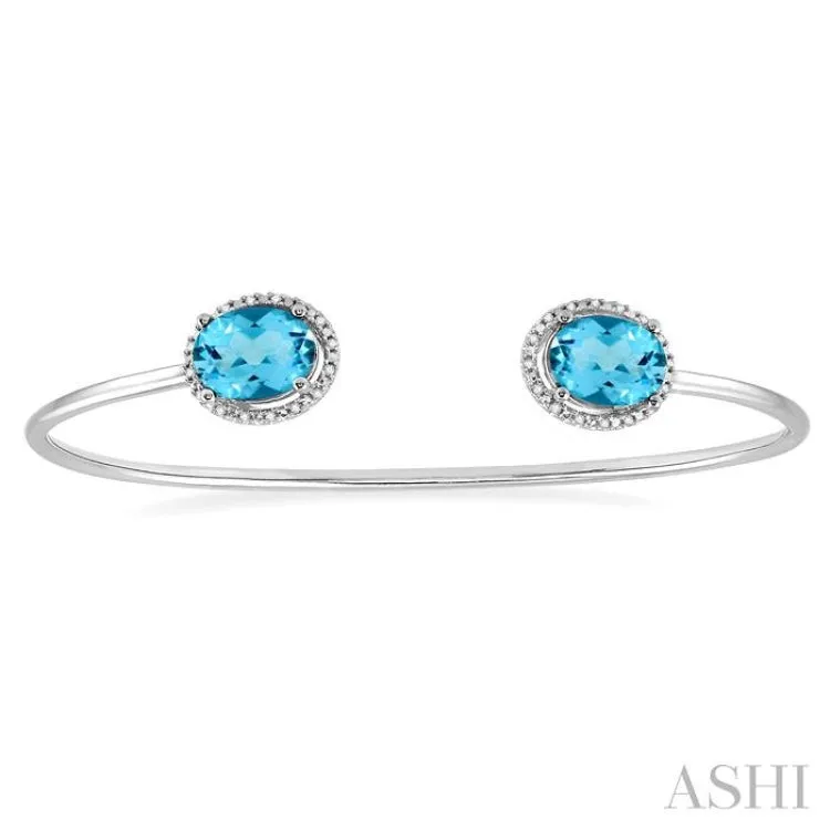 1/10 ctw Oval Shape 9x7 MM Blue Topaz & Round Cut Diamond Bangle in Sterling Silver