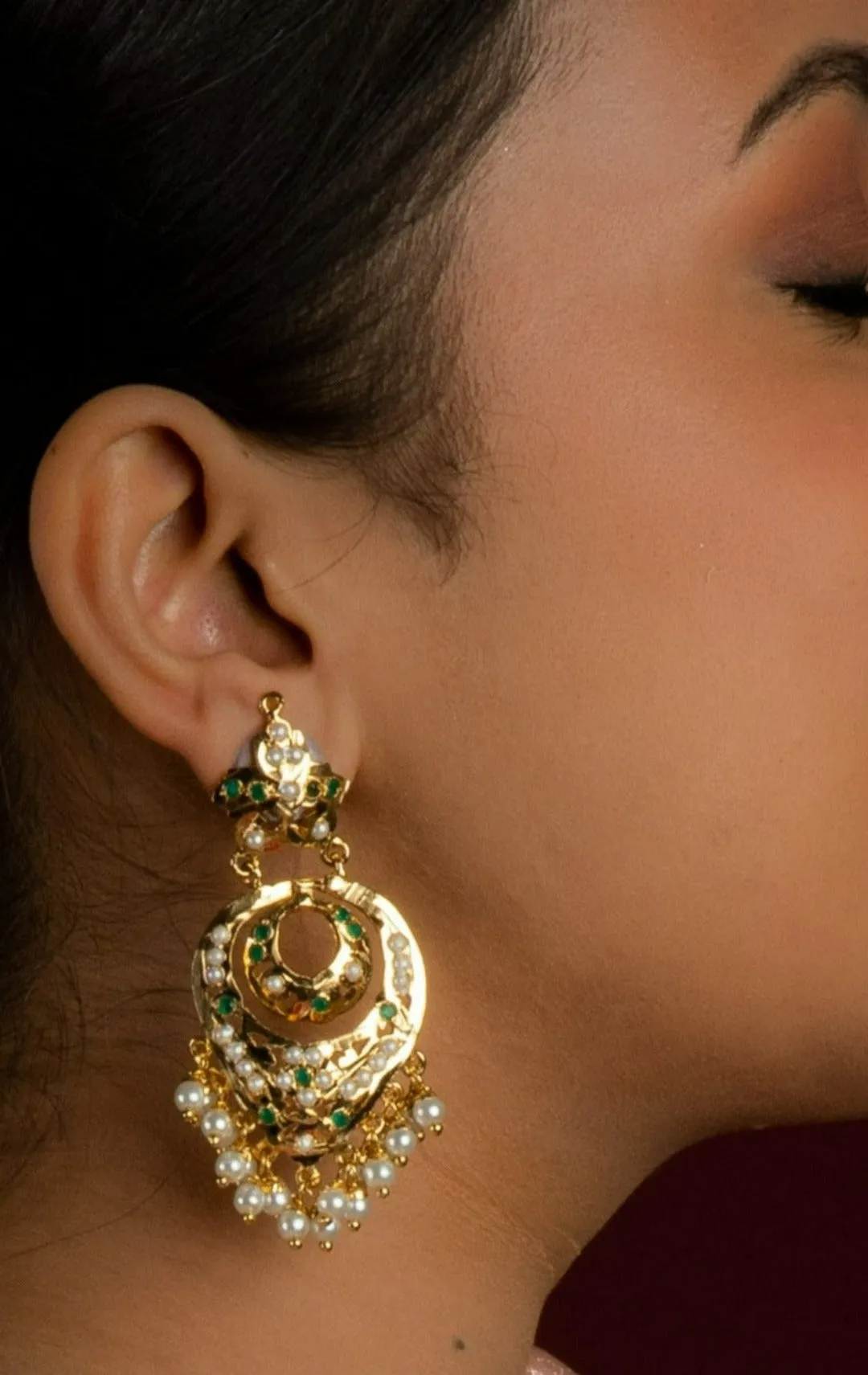 Adhira Jadau Chaandbali Earrings (Gold Plated with Emerald Green Stones and White Pearls)