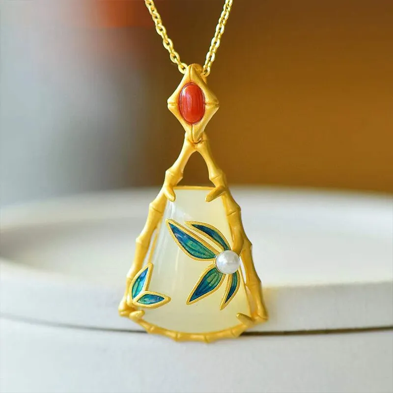 Ancient gold craft inlaid natural Hetian jade bamboo leaf pendant