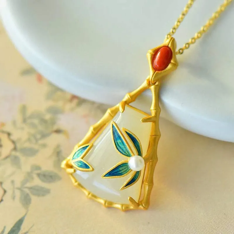 Ancient gold craft inlaid natural Hetian jade bamboo leaf pendant