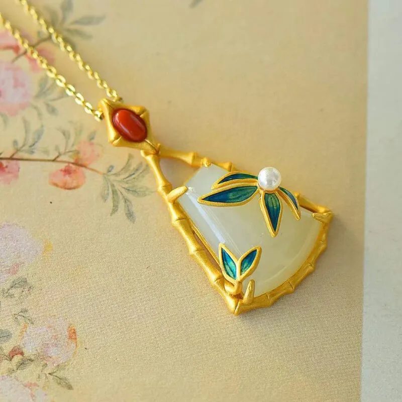 Ancient gold craft inlaid natural Hetian jade bamboo leaf pendant